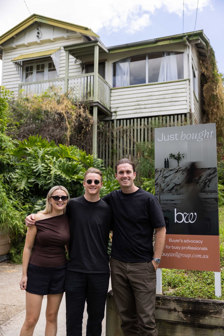 The Buywell team outside a property they helped buy